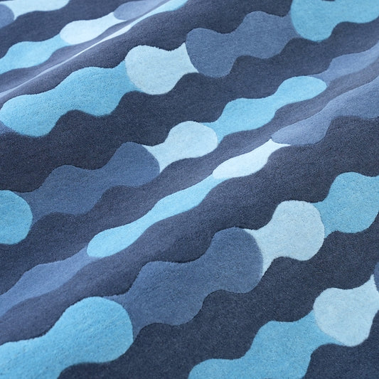 Merging Circles Blue Rug – hand-tufted blue rectangular rug by Ohana