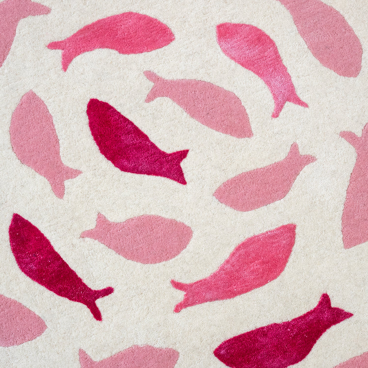 Fish Swirl Pink Rug – hand-tufted pink shaped rug by Ohana