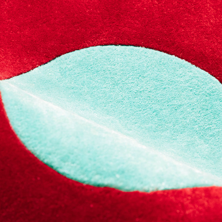 Red Blossom Rug – hand-tufted red flower-shaped rug by Ohana