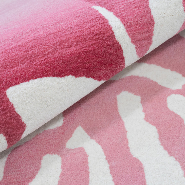 Nautilus Pink Rug – hand-tufted pink shaped rug by Ohana