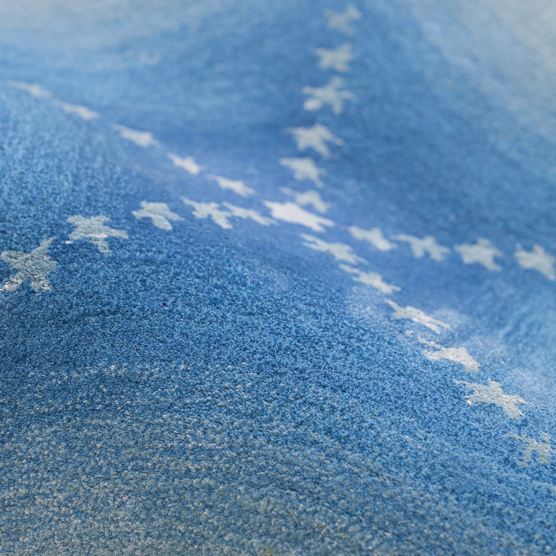Ruby Starfish Rug – hand-tufted blue shaped rug by Ohana