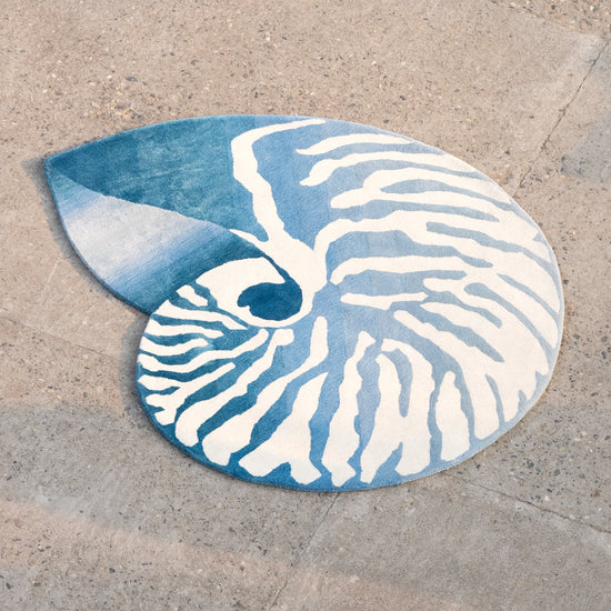 Nautilus Teal Rug – hand-tufted teal shaped rug by Ohana