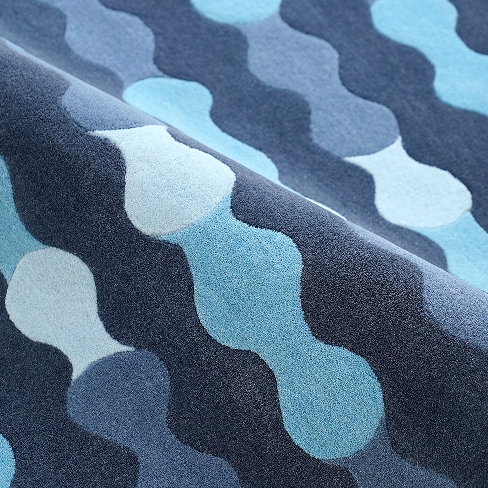 Merging Circles Blue Rug – hand-tufted blue rectangular rug by Ohana