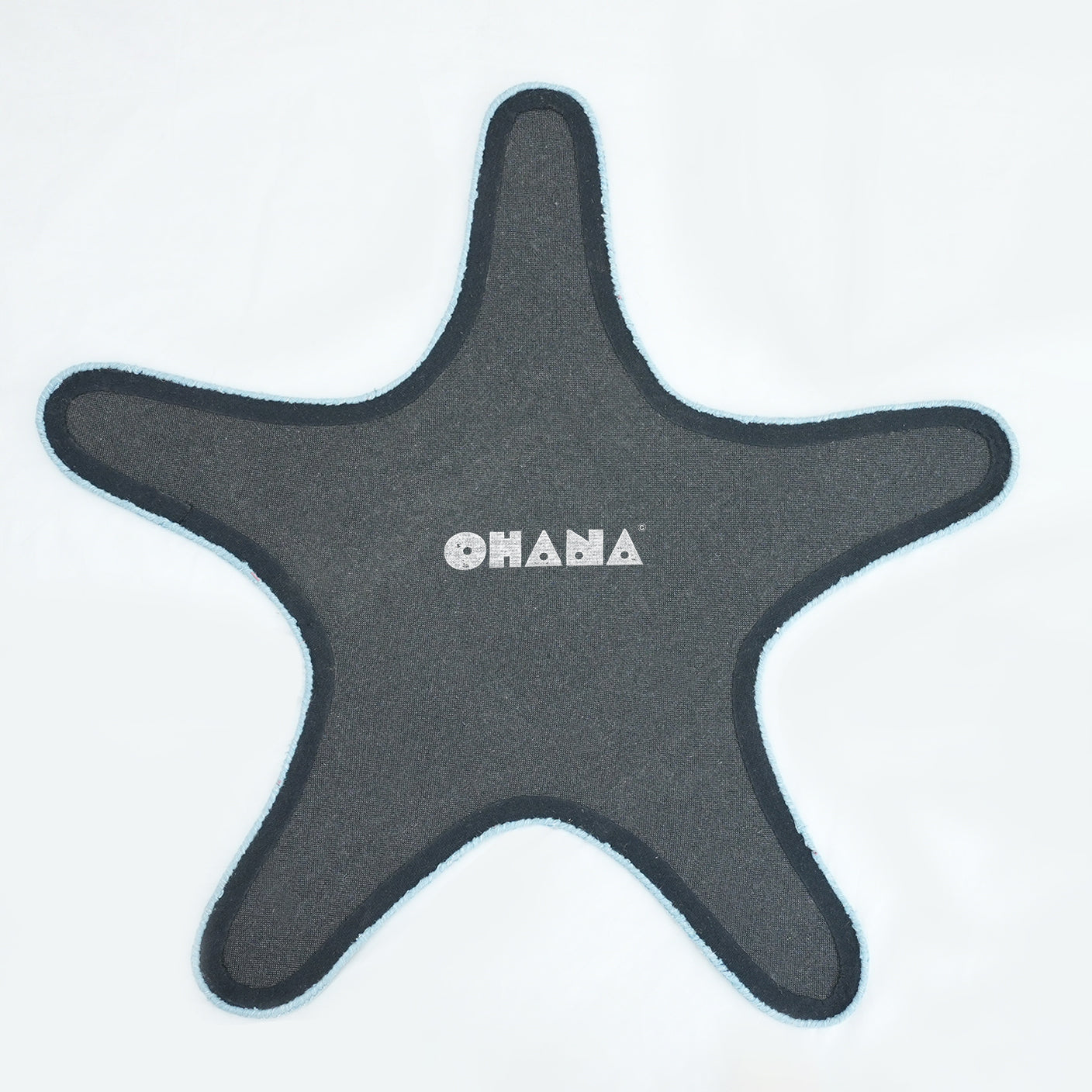 Ruby Starfish Rug – hand-tufted blue shaped rug by Ohana