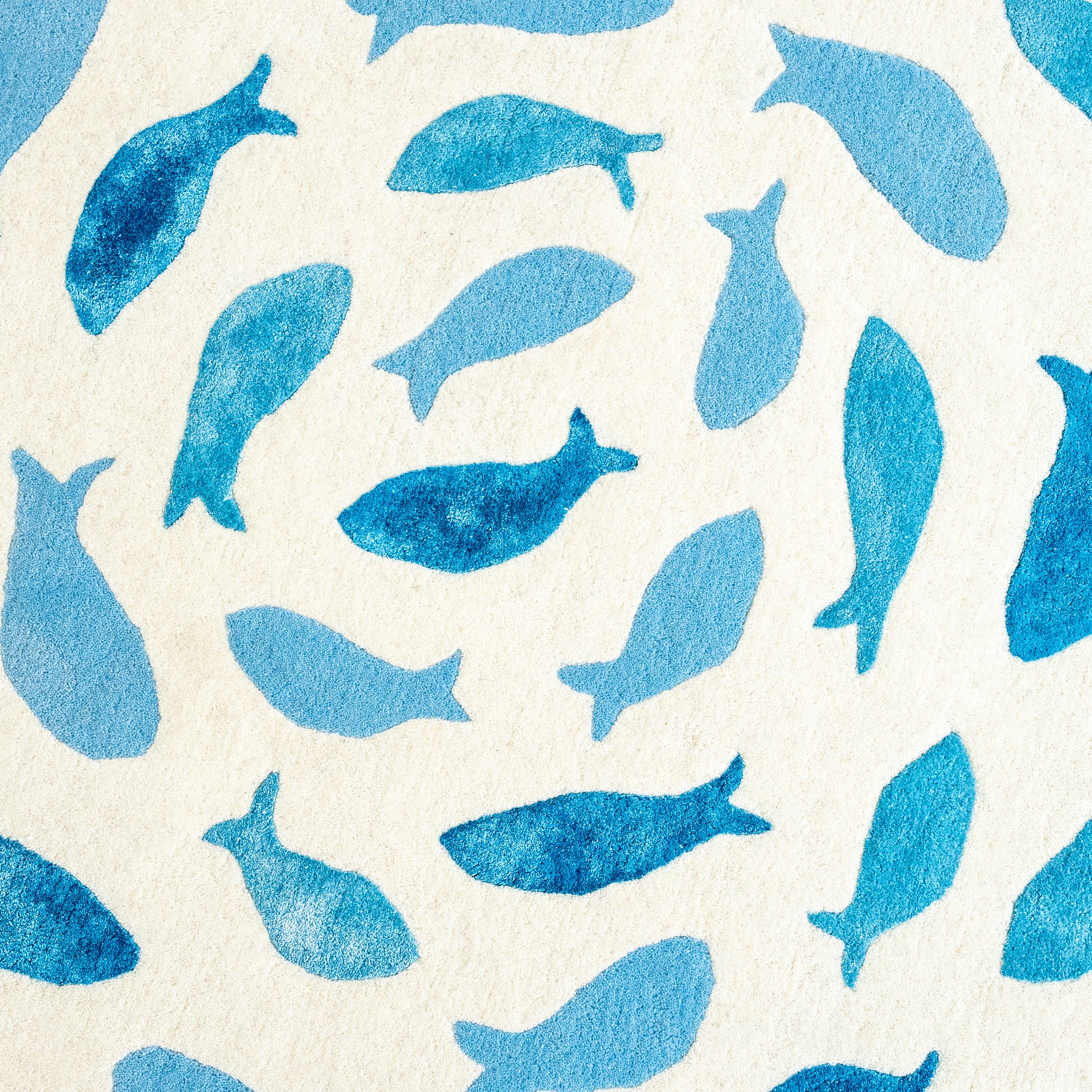 Fish Swirl Blue Rug – hand-tufted blue shaped rug by Ohana