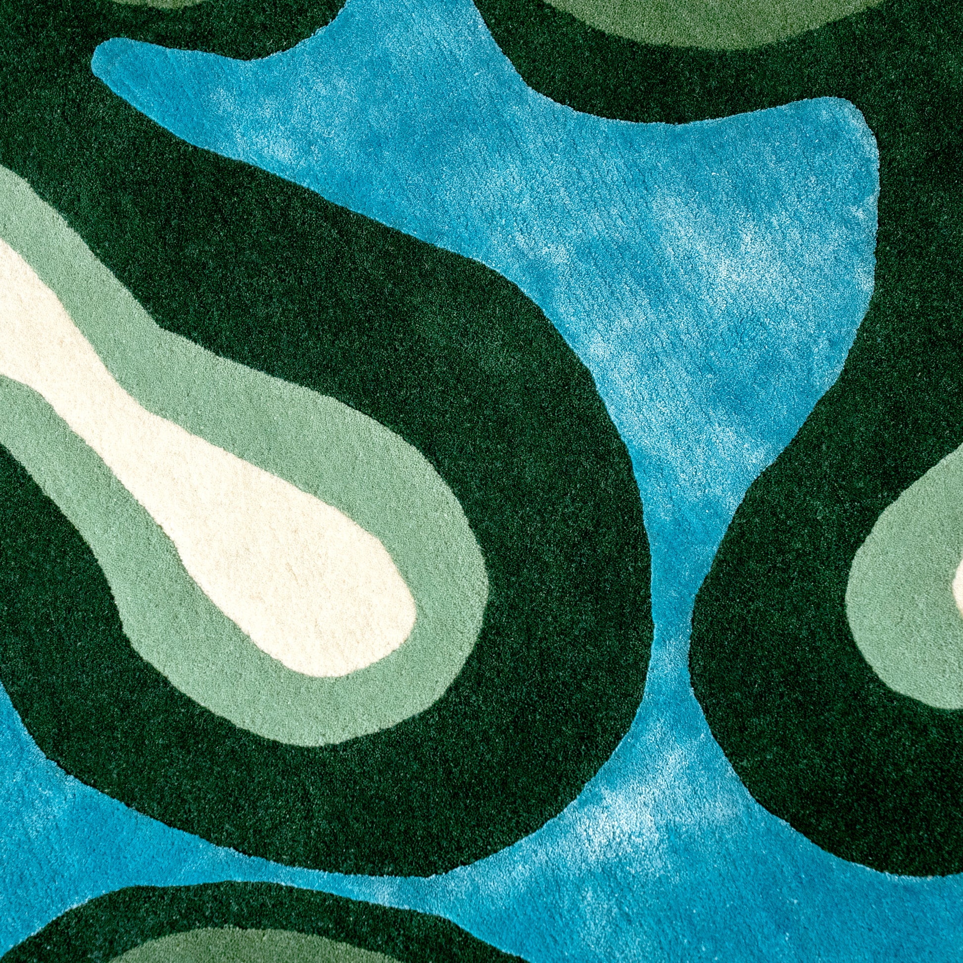 Algae Rug – hand-tufted green shaped rug by Ohana