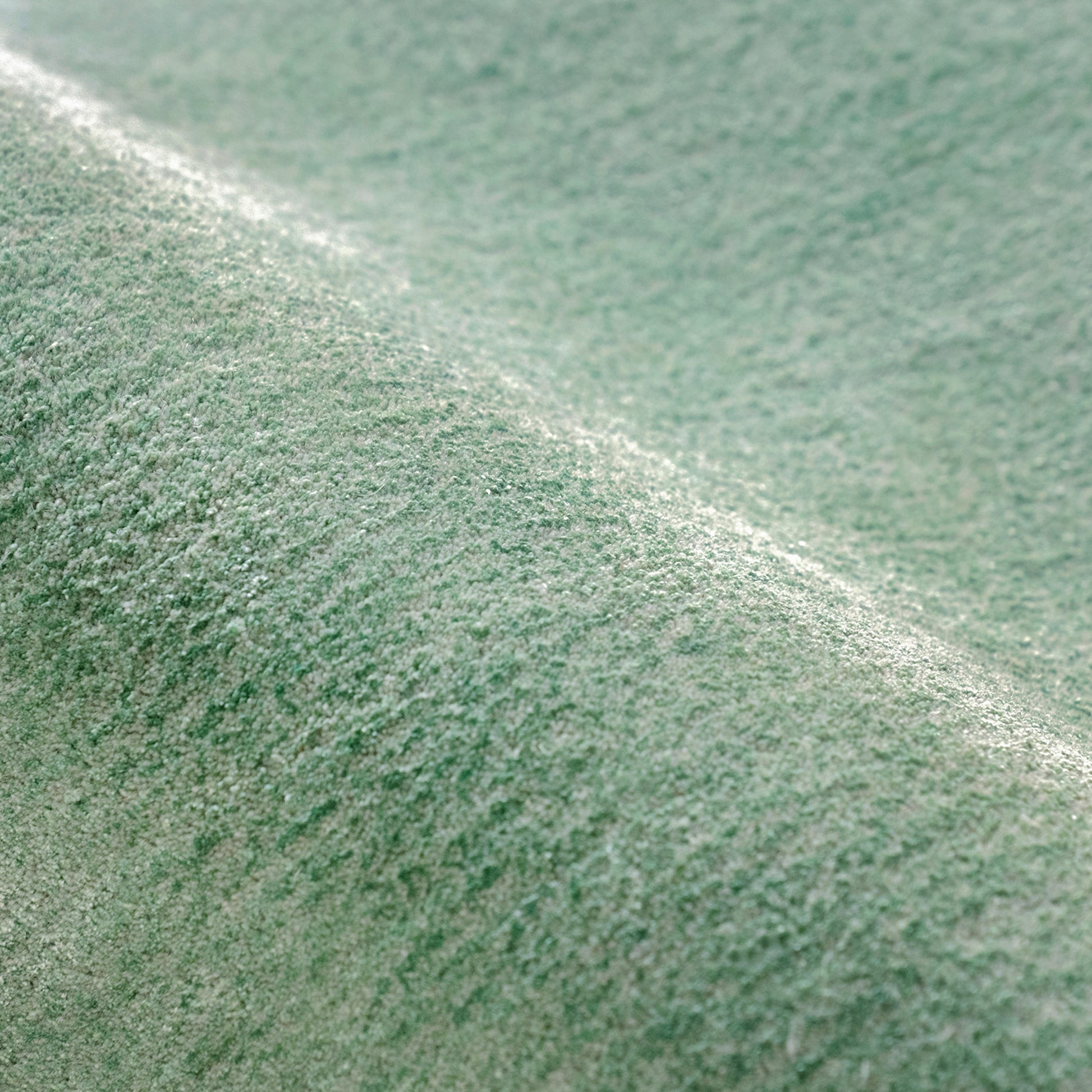 Sage Cloud Puff Rug – hand-tufted sage cloud-shaped rug by Ohana
