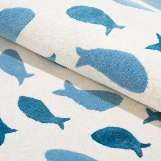 Fish Swirl Blue Rug – hand-tufted blue shaped rug by Ohana