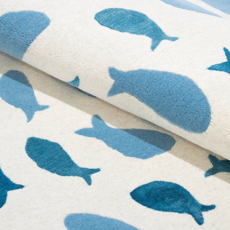 Fish Swirl Blue Rug – hand-tufted blue shaped rug by Ohana