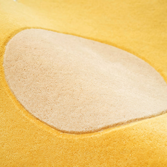 Yellow Blossom Rug – hand-tufted yellow flower-shaped rug by Ohana