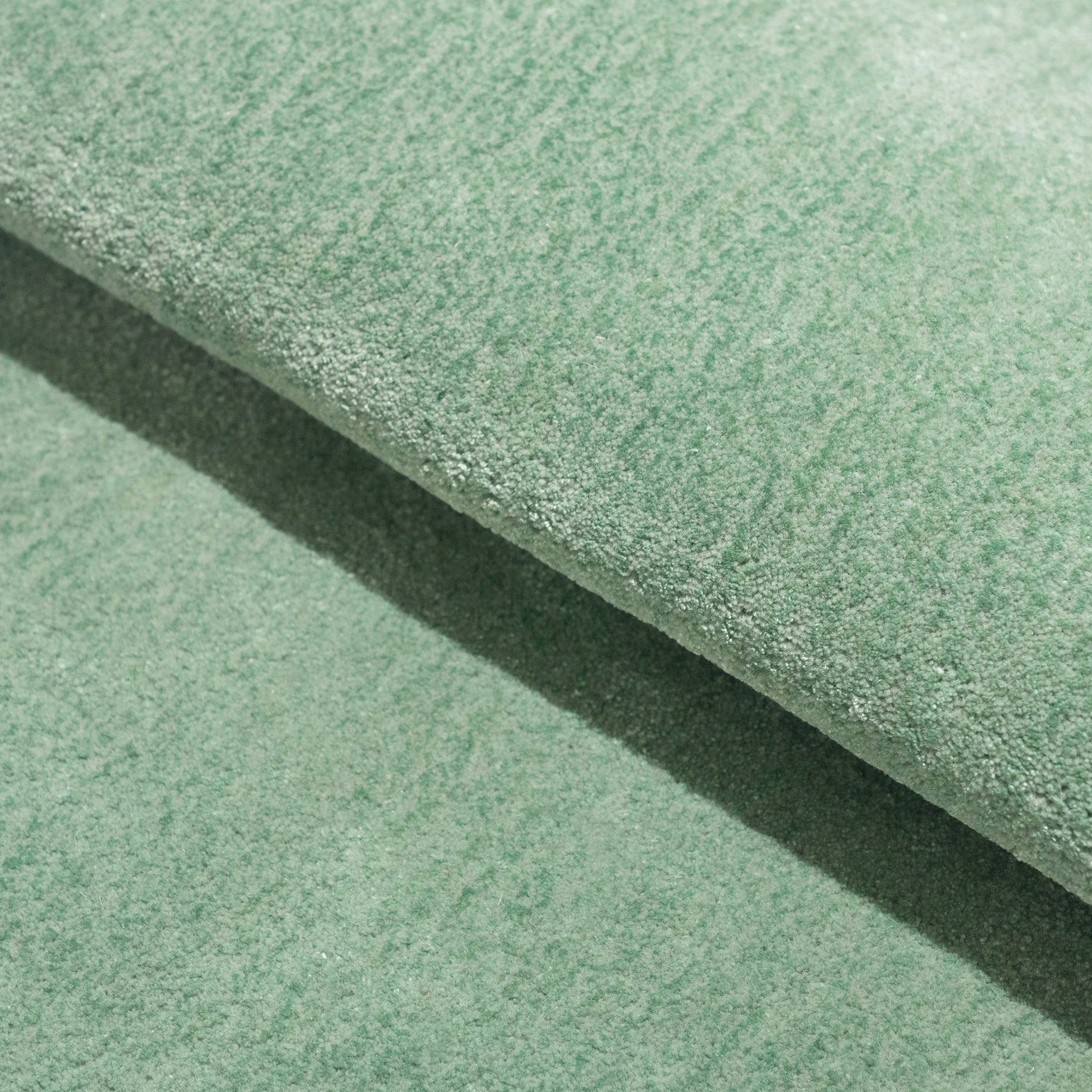 Sage Cloud Puff Rug – hand-tufted sage cloud-shaped rug by Ohana