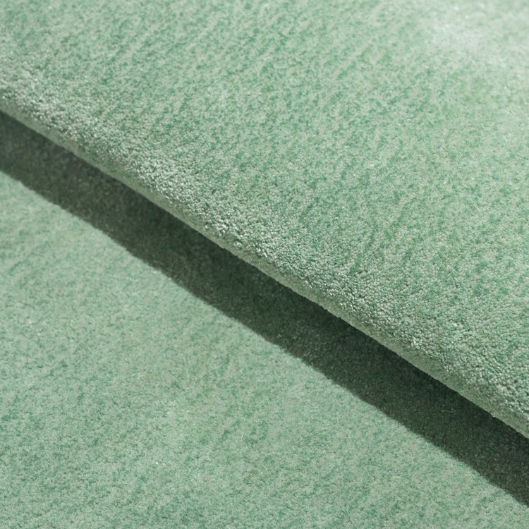 Sage Cloud Puff Rug – hand-tufted sage cloud-shaped rug by Ohana
