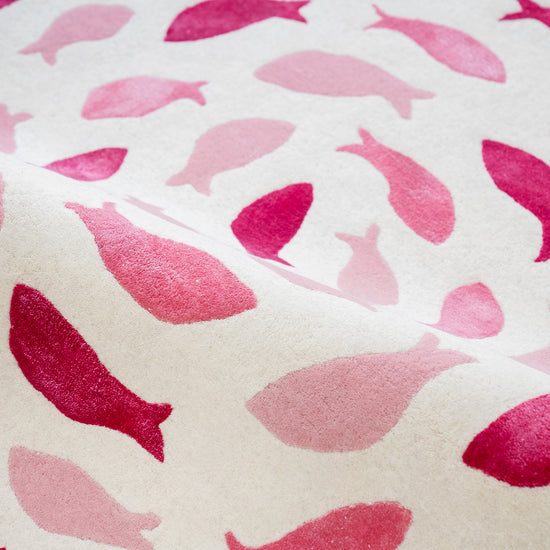 Fish Swirl Pink Rug – hand-tufted pink shaped rug by Ohana