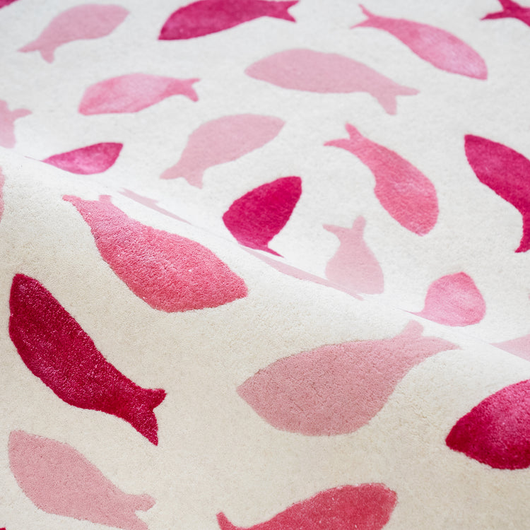 Fish Swirl Pink Rug – hand-tufted pink shaped rug by Ohana