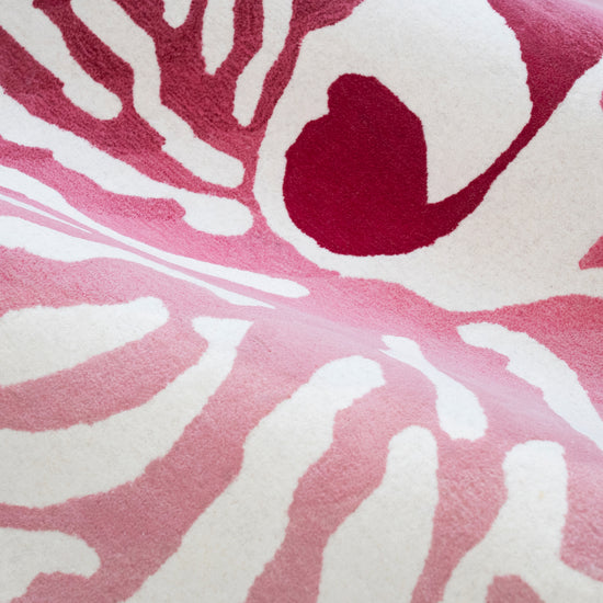 Nautilus Pink Rug – hand-tufted pink shaped rug by Ohana
