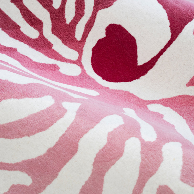 Nautilus Pink Rug – hand-tufted pink shaped rug by Ohana