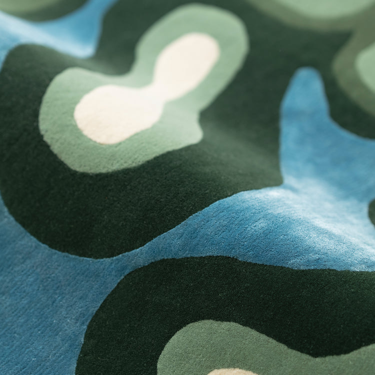 Algae Rug – hand-tufted green shaped rug by Ohana