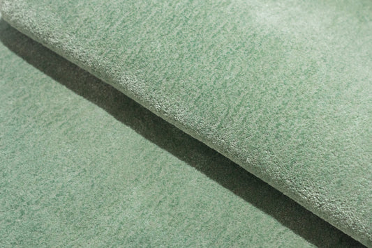 Green Cloud Puff Rug – hand-tufted green cloud-shaped rug by Ohana